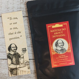 May include: A black pouch with a red label that reads "Matcha Do About Nothing". The label features a portrait of William Shakespeare and the ingredients: 100% Matcha Powder. A bookmark with a quote from Shakespeare about tea is in the background.