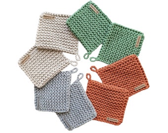 Handmade potholders or coasters made of recycled cotton in a set