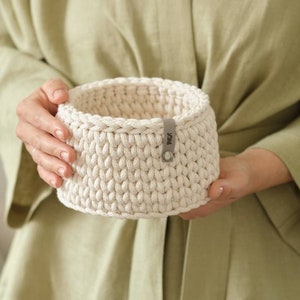 Storage basket crocheted from recycled cotton
