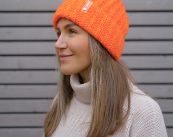 Hand-knitted hat in neon colors