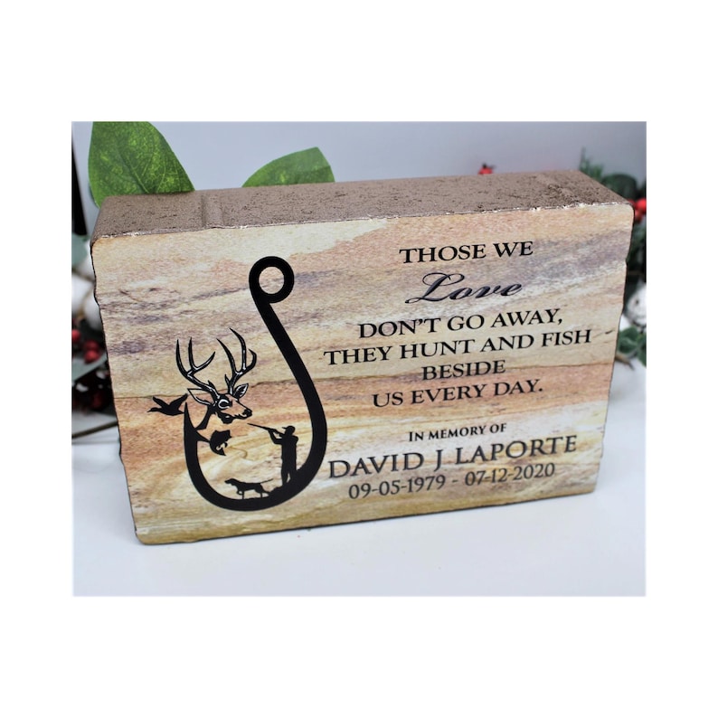 9x6 memorial garden stone for hunters with a hunting them white tail deer and fishing scene personalized with name and dates.