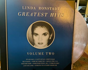 Reedición de los grandes éxitos de Linda Ronstadt en vinilo plateado (disco/álbum/LP) en perfecto estado.