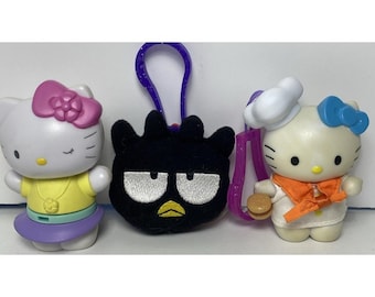 Hello Kitty 2000,01,04, Chef con hamburguesa, Badtz Maru, Llaveros giratorios McDonald's
