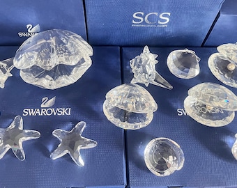 Priced individually Swarovski Crystal Clear Snail shell ,Star fish ,Shell with pearl ,Clam shell ,South Sea shell ,Oyster with black pearl