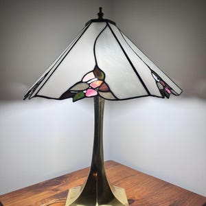 Stained glass table lamp with brass base