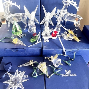 Swarovski Christmas figurines and Ornaments new in boxes with Certificate