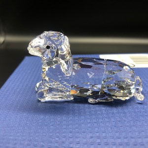 Swarovski mother sheep lying 631437