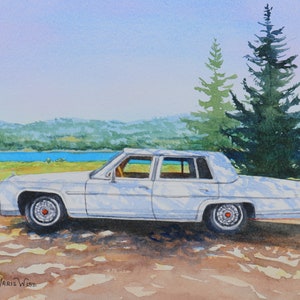 May include: Watercolor painting of a white classic car parked on a dirt road. The car has a long body and chrome details. The background features a lake, green trees, and a blue sky. The artist's signature is in the bottom left corner.
