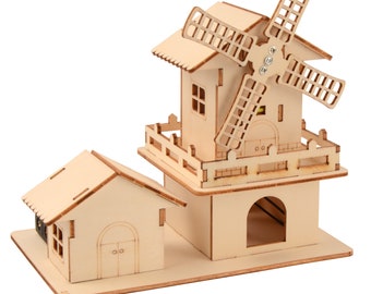 May include: A wooden model kit of a windmill and a small house. The windmill has a rotating blade and the house has a door and windows. The model is made of natural wood and is unpainted.