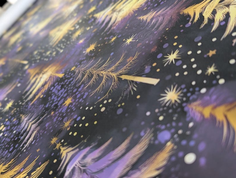 May include: Purple and gold fabric with a repeating pattern of stylized trees and stars. The fabric has a soft, brushed texture.