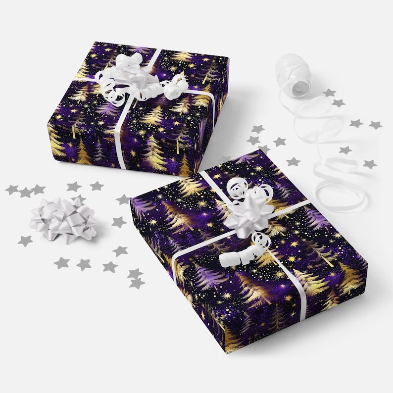 May include: Two gift boxes wrapped in purple and gold wrapping paper with a starry night and gold trees pattern. The boxes are tied with white ribbon and topped with white bows. The boxes are surrounded by silver glitter stars.