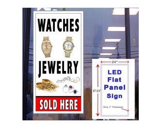 Se venden relojes y joyas aquí. Letrero de ventana con luz LED de 48" x 24".