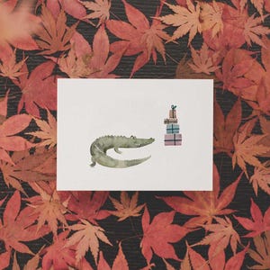Krokodil met cadeaus gedrukt op hoogwaardig papier gemaakt van 100% gerecyclede papiervezels