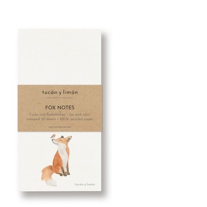May include: A white notepad with a brown band featuring the text "FOX NOTES" and a watercolour illustration of a fox and a bird. The notepad is made of 100% recycled paper and has 50 sheets.