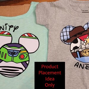 May include: Two t-shirts with a Mickey Mouse head design. The left shirt is light blue with a Buzz Lightyear design inside the Mickey Mouse head and the text "To Infinity and Beyond". The right shirt is gray with a Woody design inside the Mickey Mouse head and the text "And Beyond".