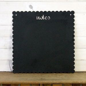 May include: Black chalkboard with a scalloped edge and the word "notes" written in white on the top.