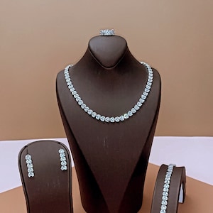 PROMISE Jewelry Set with Necklace, Bracelet, Drop Earrings, and Ring