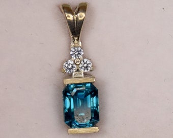 Elegant Cambodian Blue Zircon Pendant with Sapphire Accents on Sterling Silver Chain - Emerald Cut