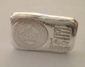 1 oz SILVER 9999 hand poured bar. Seal of the confederate states of AMERICA with first national flag. One ounce hand poured silver bar