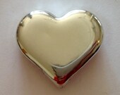 1oz silver bars .999 Hand poured silver heart 9999 fine silver. Hand poured and stamped by me 31.1g one troy ounce or more.