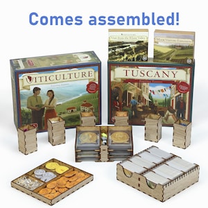 May include: Wooden organiser for the board game "Viticulture: Tuscany Edition". The organiser includes multiple compartments for storing the game's components, including cards, tokens, and tiles. The organiser is assembled and ready to use.