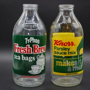 Vintage milk bottles , unique bottles , vintage kitchen ware window ornaments 1980 s