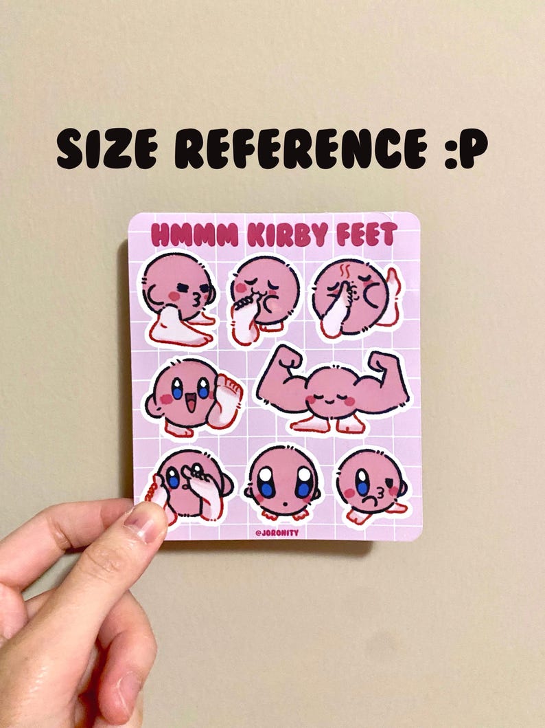 May include: A sheet of pink stickers featuring various illustrations of Kirby, a pink video game character, with the text "Hmmm Kirby Feet" at the top.