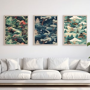 May include: Three framed prints with a Japanese-inspired design featuring a repeating pattern of mountains, pagodas, trees, and clouds in shades of blue, green, and pink.
