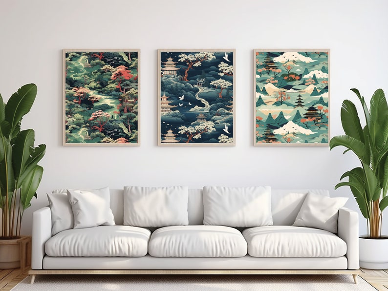 May include: Three framed prints with a Japanese-inspired design featuring a repeating pattern of mountains, pagodas, trees, and clouds in shades of blue, green, and pink.