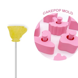 May include: Pink cake pop mold with a teacup design. CAKEPOP MOLD is written in white text on a pink circle.
