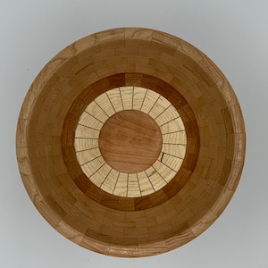 Cherry segmented bowl with white ash and walnut accents