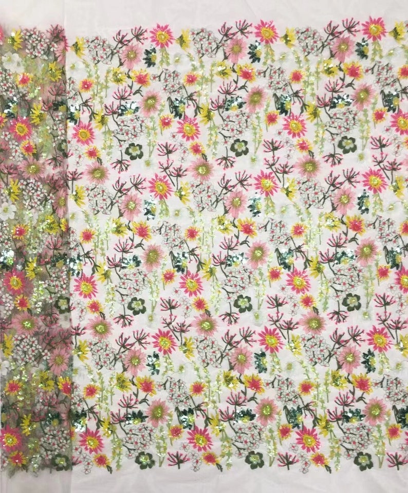May include: Pink, yellow, and green floral embroidered fabric with sequins. The fabric has a mesh backing.
