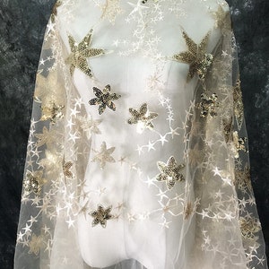 Tela de encaje bordada con estrellas y lentejuelas doradas sobre tela de tul transparente para vestidos de princesa, ropa formal, vestidos de noche o vestidos de bebé