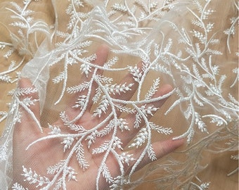 Tissu exquis de dentelle de Venise en tissu de tulle brodé de feuille d'ivoire pour des robes de mariée de mariage 1 mètre