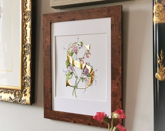 S is for Sweetpeas Gilded Print. A gold letter S with intertwined pastel sweetpeas and a bumblebee. It catches the light beautifully.