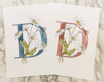 D is for Daisy pink or Blue initial print. Lovely in a nursery or childs room, a coloured letter D with intertwined daisies and a bumblebee.