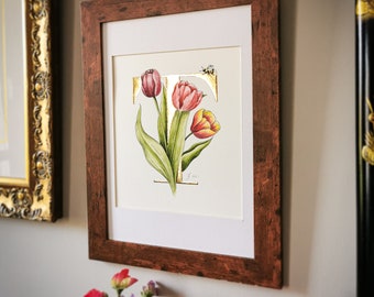 T is for Tulips, Original gouache, ink and 23.5 karat gold painting. A gold letter T with intertwined tulips and a bumblebee. Comes mounted.