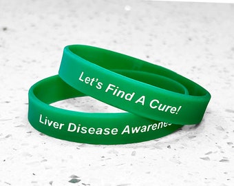 May include: Two green silicone wristbands with white text. The top band reads "Let's Find A Cure!" and the bottom band reads "Liver Disease Awareness".