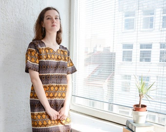 Vestido midi vintage con estampado africano marrón de los años 80