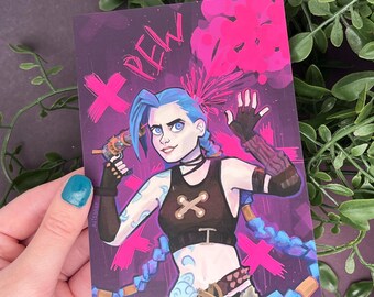 May include: A digital illustration of a female character with blue hair and a pink and purple background. The character is holding a gun and has a pink explosion behind her. The text "PEW!" is written in pink above her head.