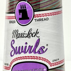 May include: A spool of Maxi-Lock Swirls serger thread in a multi-colored swirl pattern. The thread is 3000 yards and 2742 meters long. It is decorative spun polyester.