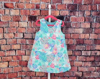 Unicornios y flores vestido para bebé niña pequeña primer cumpleaños. Tropical pastel primavera verano vacaciones Pascua foto familiar lindo preppy