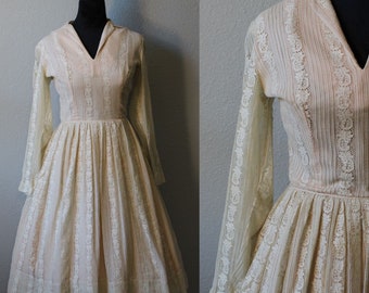 Vintage 1950s White Lace Dress with Long Sheer Sleeves, Full Skirt and Pink Lining