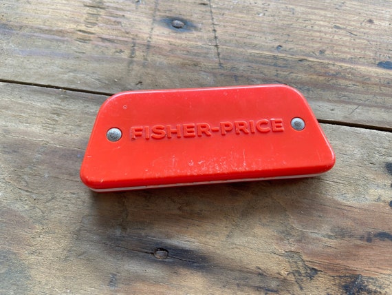 fisher price harmonica