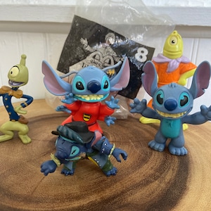 Vintage Disney’s Lilo and Stitch toy figures