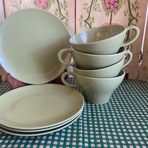 Olive green melamine tea cups and bread plates