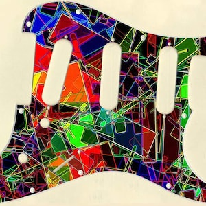 May include: A colorful guitar pickguard with a geometric pattern in shades of red, orange, yellow, green, blue, and purple. The pickguard is made of a black material with a glossy finish.