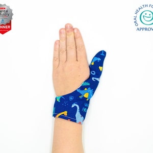 Thumbsie® Protector para el pulgar / Detener la succión del dedo / Chupar el dedo / Guante para el pulgar / Varios tejidos / Cinco tamaños Dinosaur
