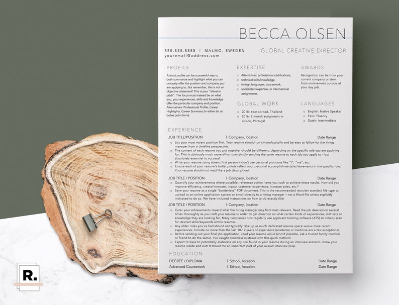 May include: A resume template with a wood grain background. The template is designed for a creative director and includes sections for profile, expertise, awards, global work, languages, experience, and education.