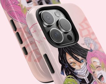 May include: A light pink phone case featuring a colorful anime illustration. The case has a black camera lens frame and a glossy finish. The design includes characters with pink and black hair, and a white face covering.